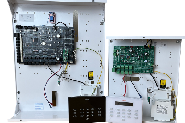 FoxSec PRO-series Grade 3 security system featuring control boards, power supplies, and access keypads in white enclosures